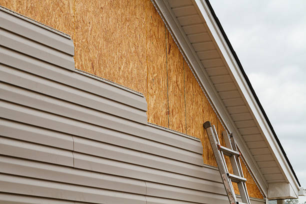 Professional Emergency Siding Repair technician working in Taylorsville, NC